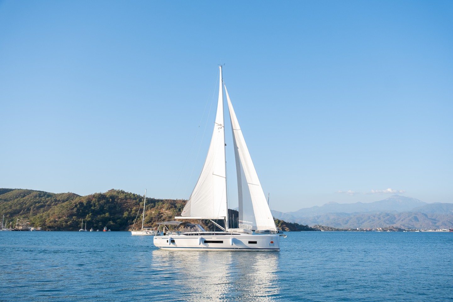 Eco solar yacht anchored in a Turquoise Coast cove near Fethiye