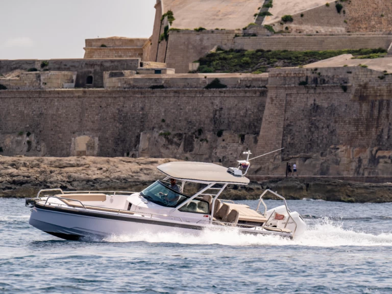 Location Bateau à moteur à San Ġiljan - Axopar 28 T-Top