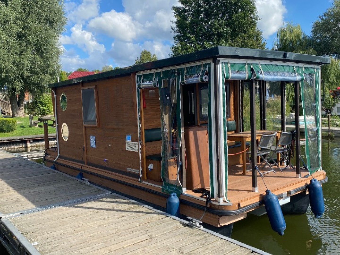 Floss D7 eco solar houseboat charter at Yachthafen Priepert, Germany