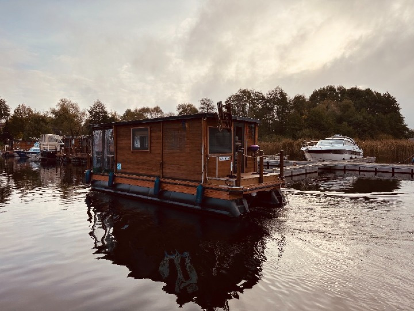 Floss D9 eco solar houseboat charter at Yachthafen Priepert, Germany