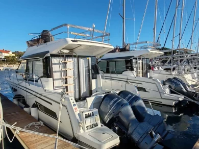 Jeanneau Merry Fisher 1095 Fly charter bareboat or captained in  Drage