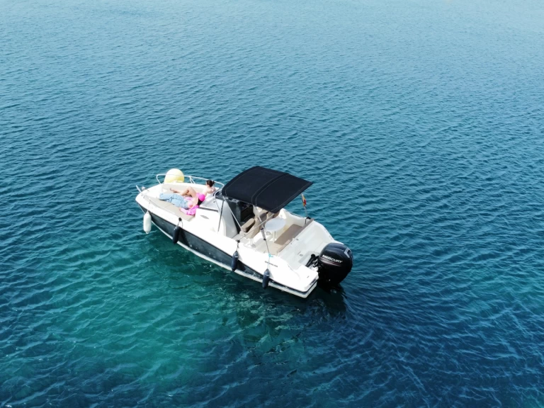 Quicksilver Activ 605 Sundeck a louer à Calp / Calpe
