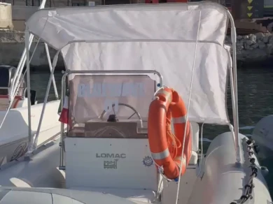 Charter a Lomac Lomac 500 OK in Porto di Reggio Calabria on Samboat